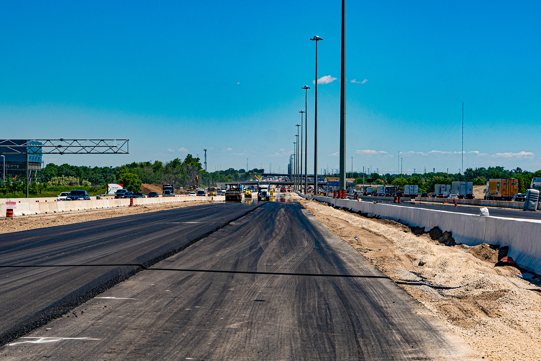 Asphalt Paving Works on the Centre Lanes Nearing Sixth Line
